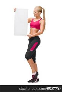 fitness, dieting and advertisement concept - happy smiling sportswoman with white blank board