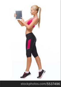 fitness, dieting, technology and healthcare concept - sporty woman showing something on tablet pc screen