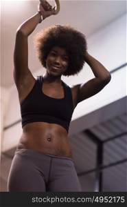 Fitness dip ring beautiful young african american woman workout at gym dipping exercise