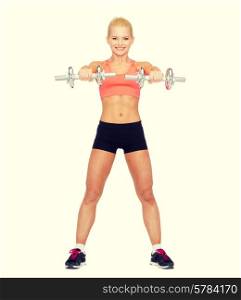 fitness, exercising and exercise concept - smiling sporty woman with heavy steel dumbbells