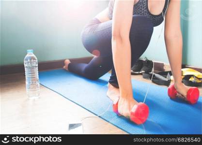 Fitness female stretching her body on yoga mat, Workout and Healthy lifestyle concept