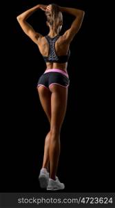 Fitness girl isolated on black