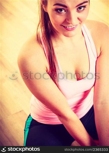 Fitness health muscles warmup concept. Attractive lady in gym. Young girl during workout in sporty outfit.. Attractive lady in gym.
