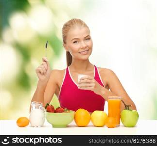 fitness, healthcare and diet concept - smiling young woman eating healthy breakfast