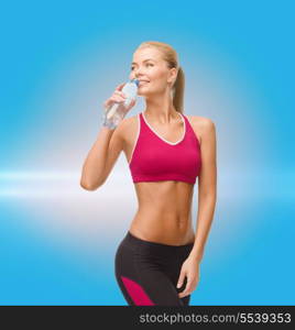 fitness, healthcare and dieting concept - smiling sporty woman with bottle of water