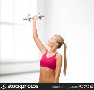 fitness, healthcare and dieting concept - young sporty woman with heavy steel dumbbell