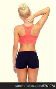 fitness, healthcare and medicine concept - sporty woman touching her neck