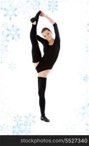 fitness instructor in black leotard with snowflakes