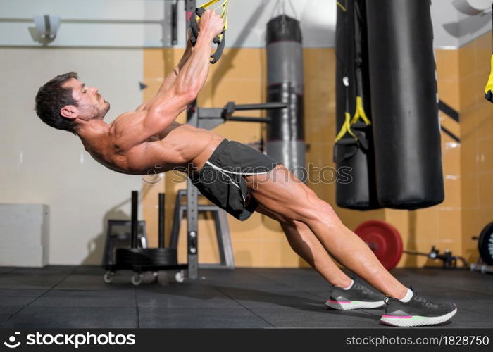 Fitness Man Doing Functional Training At Gym. High quality photo.. Fitness Man Doing Functional Training At Gym.