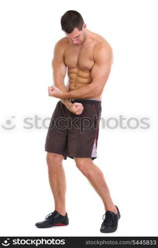 Fitness man showing muscular body