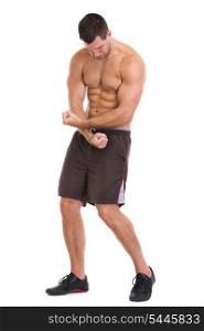 Fitness man showing muscular body