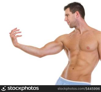 Fitness man with muscular body gracefully posing