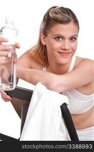 Fitness series - Woman with exercise bike and bottle of water on white background