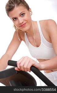 Fitness series - Woman with headphones exercising on white background