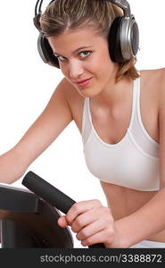 Fitness series - Woman with headphones exercising on white background