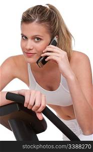 Fitness series - Woman with mobile phone on white background