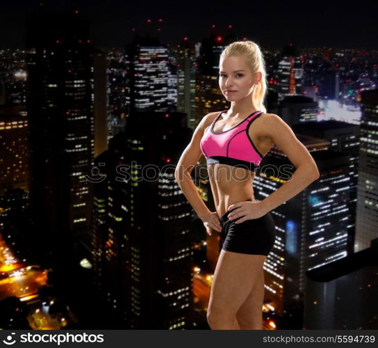 fitness, sport and diet concept - beautiful athletic woman in sportswear