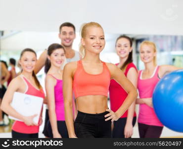 fitness, sport and diet concept - beautiful athletic woman in sportswear