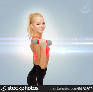 fitness, sport and diet concept - smiling beautiful sporty woman with dumbbell