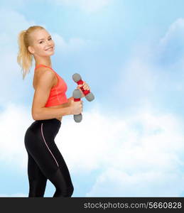 fitness, sport and diet concept - smiling beautiful sporty woman with dumbbells