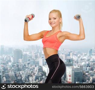 fitness, sport and diet concept - smiling beautiful sporty woman with dumbbells