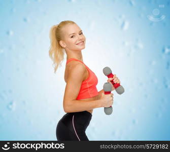 fitness, sport and diet concept - smiling beautiful sporty woman with dumbbells