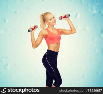 fitness, sport and diet concept - smiling beautiful sporty woman with dumbbells