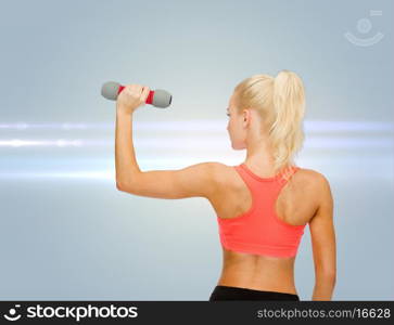 fitness, sport and diet concept - young sporty woman with light dumbbell