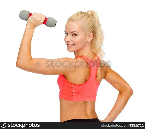 fitness, sport and diet concept - young sporty woman with light dumbbell