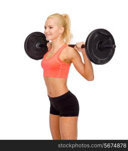 fitness, sport and dieting concept - smiling sporty woman exercising with barbell