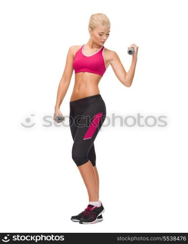 fitness, sport and dieting concept - young sporty woman with light dumbbells