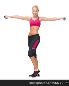 fitness, sport and dieting concept - young sporty woman with light dumbbells