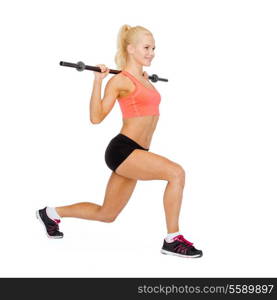 fitness, sport and exercise concept - smiling sporty woman with barbell doing split squat or lunge