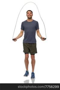 fitness, sport and healthy lifestyle concept - happy smiling man skipping with jump rope over white background. smiling man exercising with jump rope