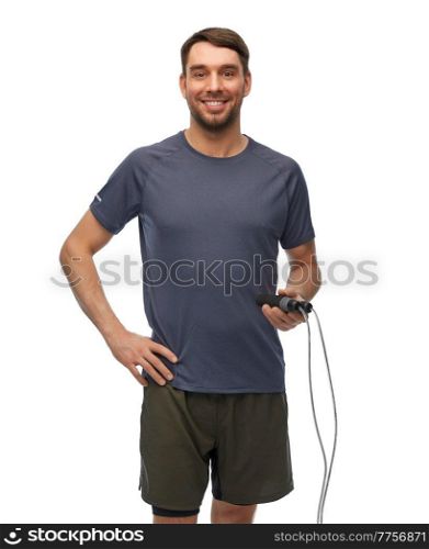 fitness, sport and healthy lifestyle concept - happy smiling man with jump rope over white background. smiling man exercising with jump rope