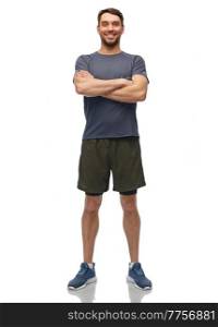 fitness, sport and healthy lifestyle concept - smiling man in sports clothes over white background. smiling man in sports clothes