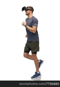fitness, sport and healthy lifestyle concept - smiling man in vr glasses with smart watch or tracker running over white background. happy man in vr glasses running and training