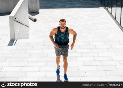 fitness, sport and healthy lifestyle concept - young man running upstairs. young man running upstairs