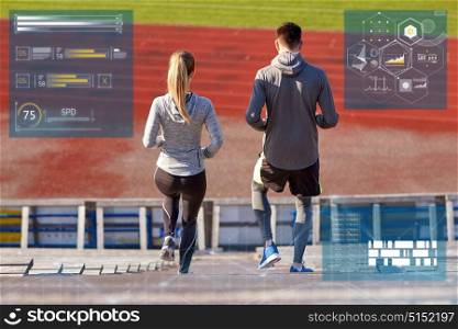 fitness, sport and people concept - couple walking downstairs on stadium. couple walking downstairs on stadium