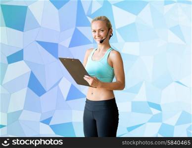 fitness, sport and people concept - happy woman sports trainer with microphone and clipboard over blue graphic low poly background