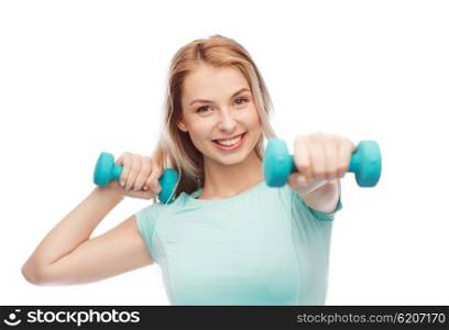 fitness, sport, exercising and people concept - smiling beautiful sporty woman with dumbbell in fight stand