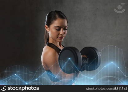 fitness, sport, exercising, training and people concept - young woman flexing muscles with dumbbells in gym. young woman flexing muscles with dumbbells in gym