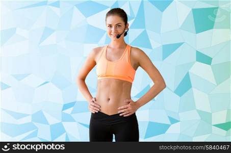 fitness, sport, people and training concept - female sports trainer with microphone woman over blue graphic low poly background