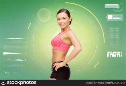 fitness, sport, technology and people concept - happy smiling sporty woman over green background. happy smiling sporty woman over green background