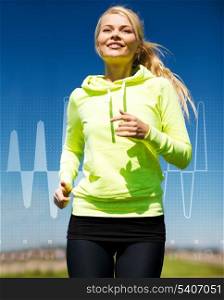 fitness, sport, training and lifestyle concept - smiling female runner jogging outdoors