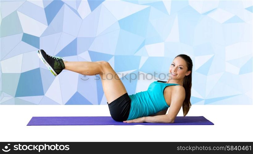 fitness, sport, training and people concept - smiling woman flexing abdominal muscles on mat over blue graphic low poly background