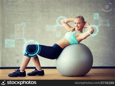 fitness, sport, training, future technology and lifestyle concept - smiling woman with exercise ball in gym over virtual screen projections