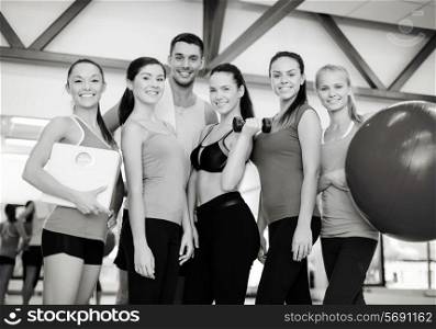 fitness, sport, training, gym and lifestyle concept - group of smiling people in the gym