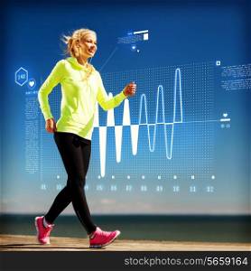 fitness, sport, training, technology and lifestyle concept - woman doing sports outdoors with earphones