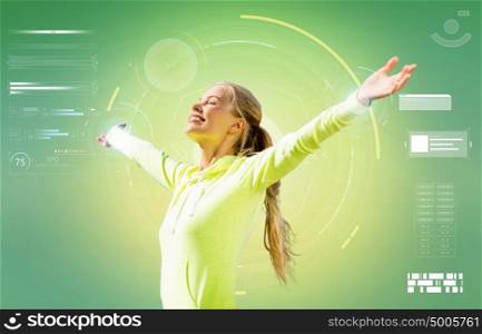 fitness, sport, victory, people and happiness concept - happy smiling woman enjoying sunlight over green background. happy woman doing sports and enjoying sunlight